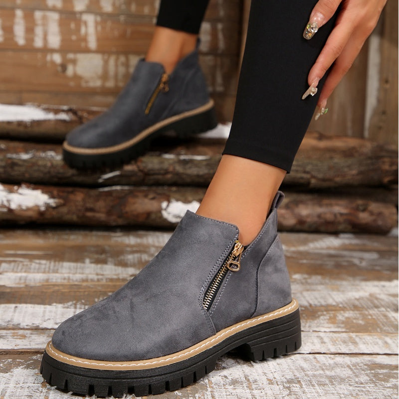 ZipStryde Sleek Zip Ankle Boots - close-up of heel construction and sole edge
