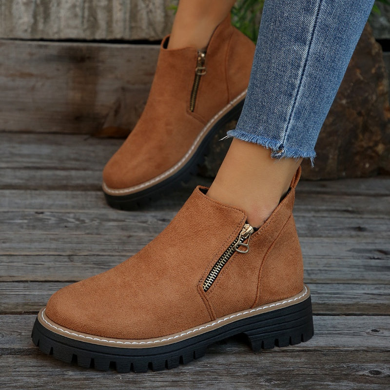 ZipStryde Sleek Zip Ankle Boots - both boots positioned to show inner and outer sides